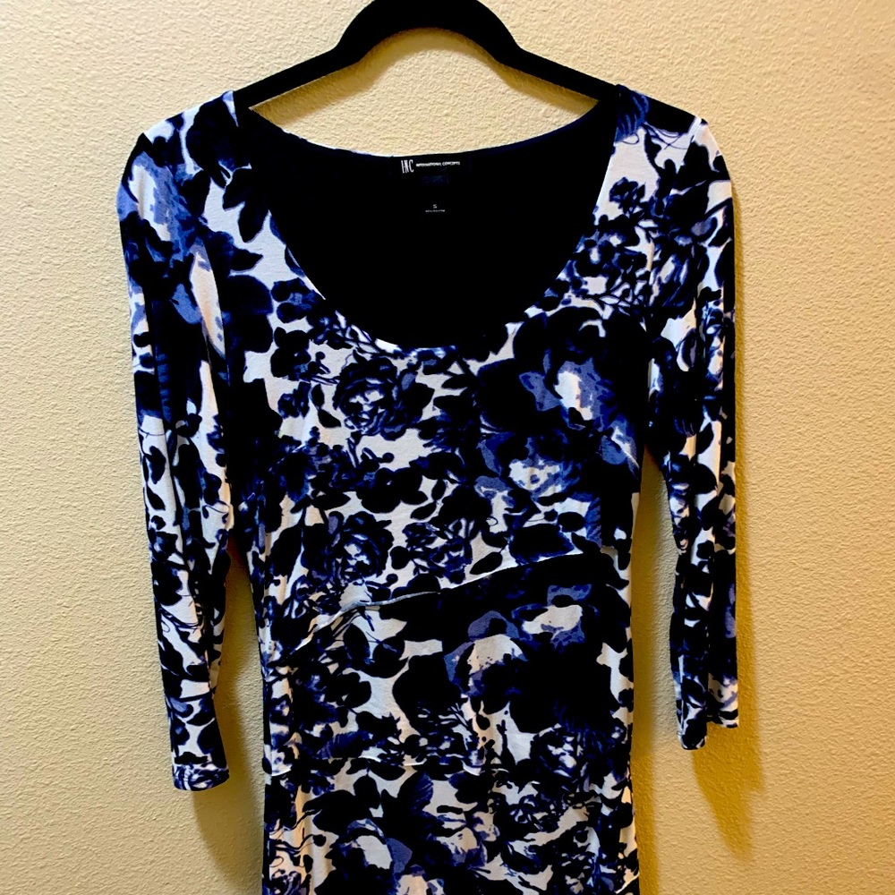 Beautiful small dress with layers of fabric front and back